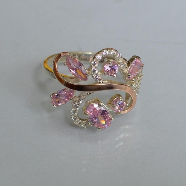 Срібна каблучка з золотими вставками