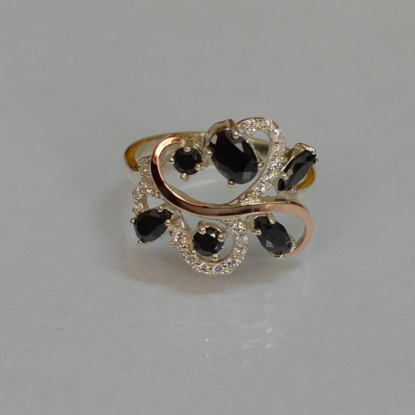 Срібна каблучка з золотими вставками