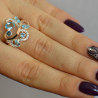 Срібна каблучка з золотими вставками