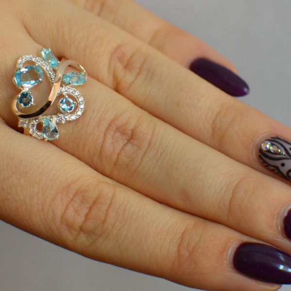 Срібна каблучка з золотими вставками