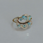 Срібна каблучка з золотими вставками