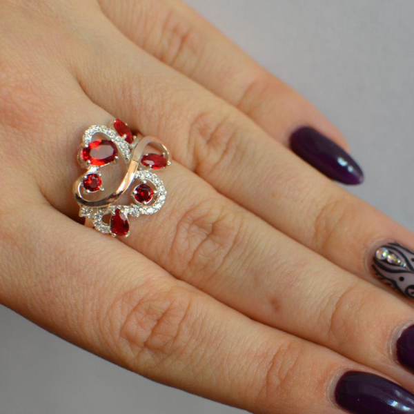 Срібна каблучка з золотими вставками