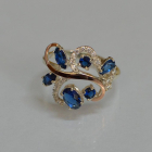 Срібна каблучка з золотими вставками