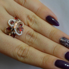 Срібна каблучка з золотими вставками