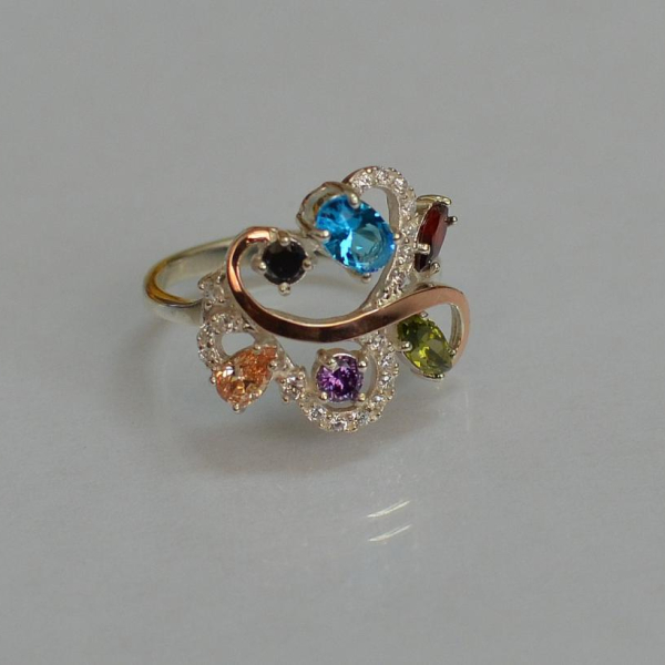 Срібна каблучка з золотими вставками