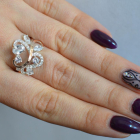 Срібна каблучка з золотими вставками