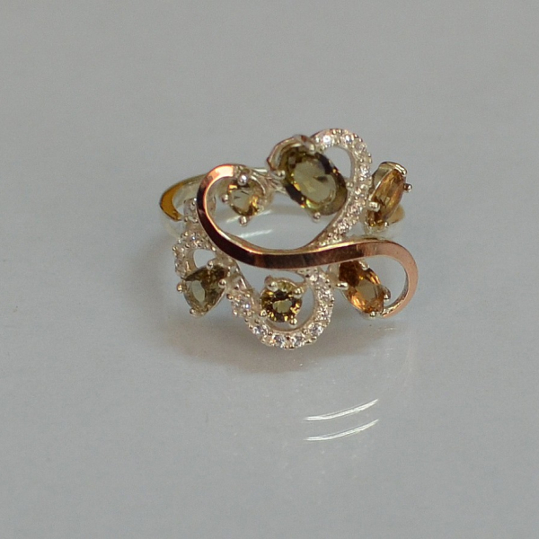 Срібна каблучка з золотими вставками