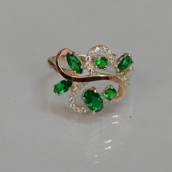 Срібна каблучка з золотими вставками