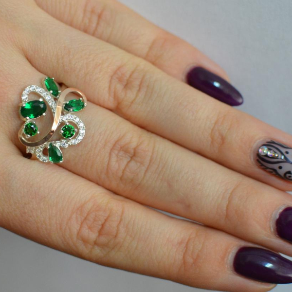 Срібна каблучка з золотими вставками