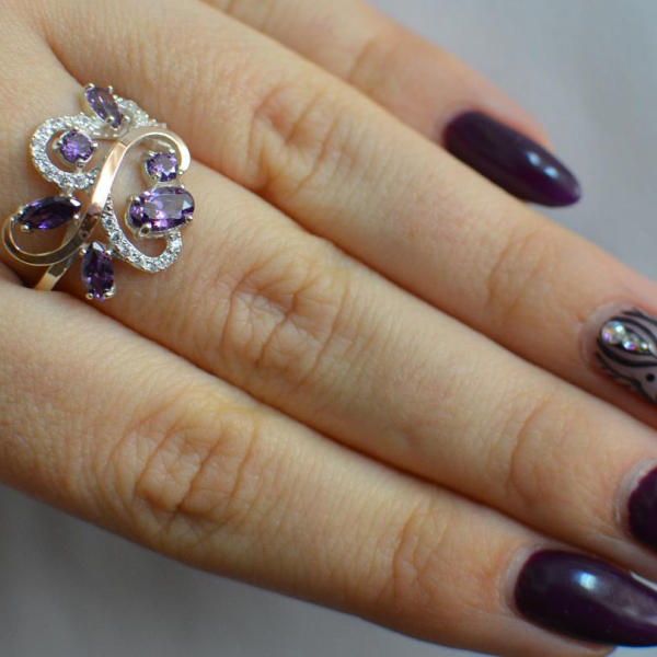 Срібна каблучка з золотими вставками