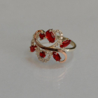 Срібна каблучка з золотими вставками