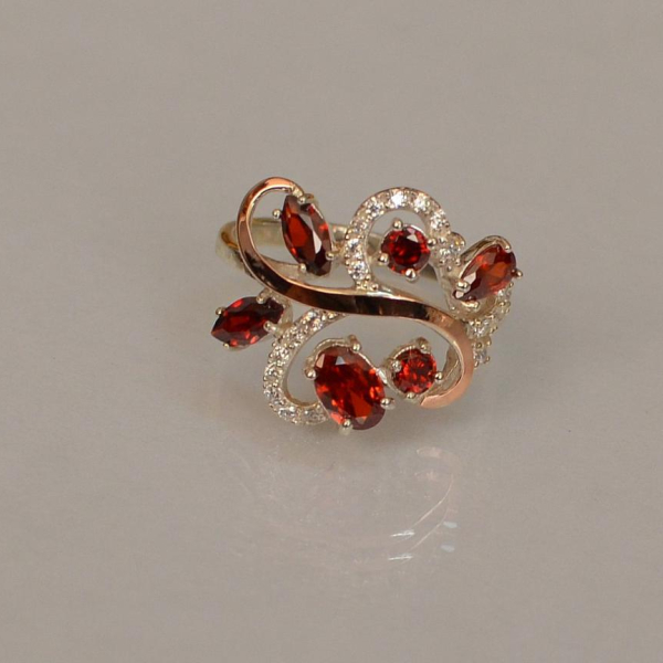 Срібна каблучка з золотими вставками