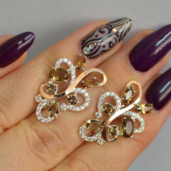 Срібні сережки з золотими вставками