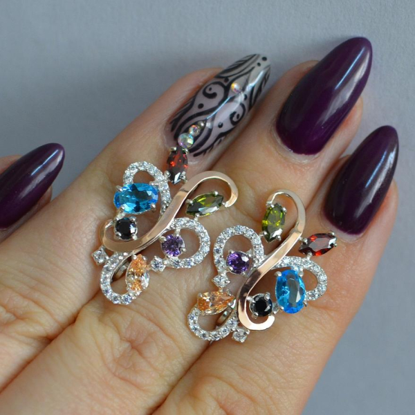 Срібні сережки з золотими вставками