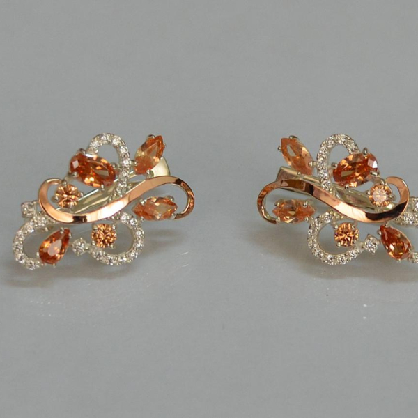 Срібні сережки з золотими вставками