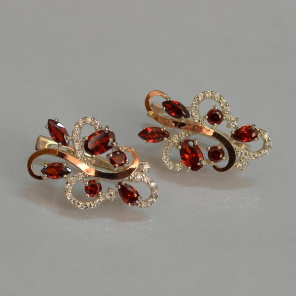 Срібні сережки з золотими вставками