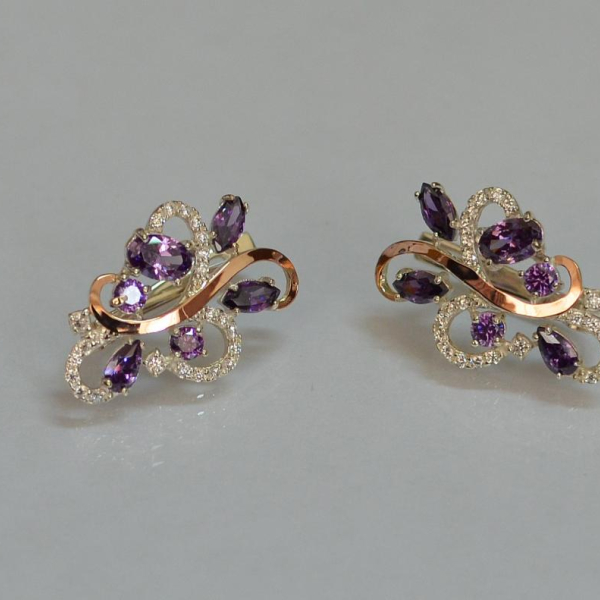 Срібні сережки з золотими вставками