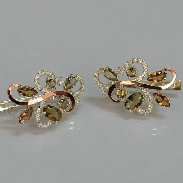 Срібні сережки з золотими вставками