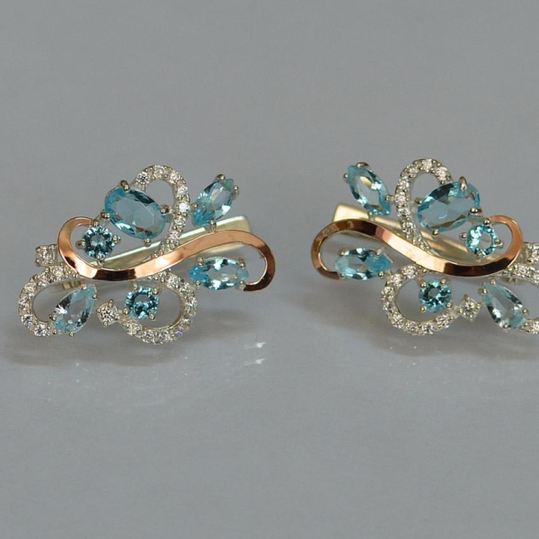 Срібні сережки з золотими вставками