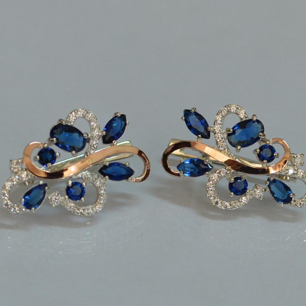 Срібні сережки з золотими вставками