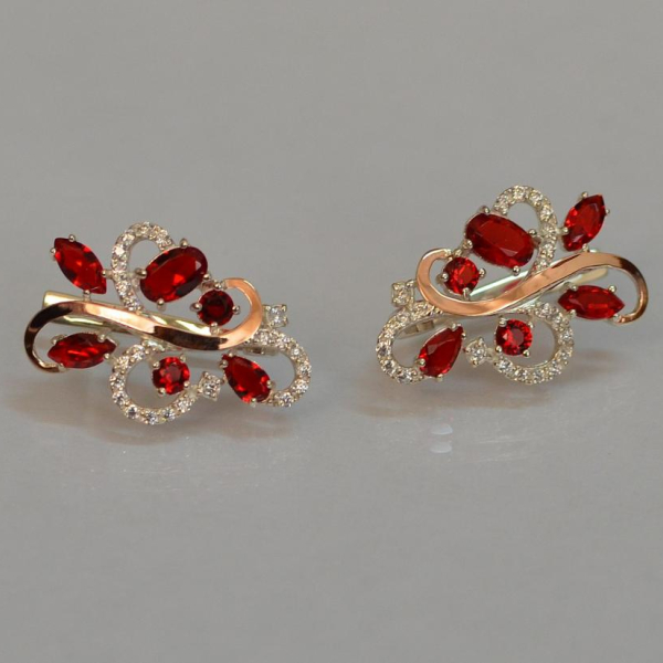 Срібні сережки з золотими вставками