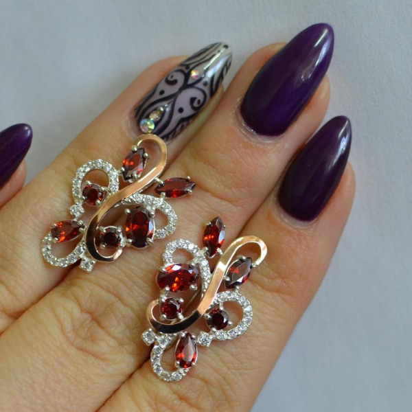 Срібні сережки з золотими вставками