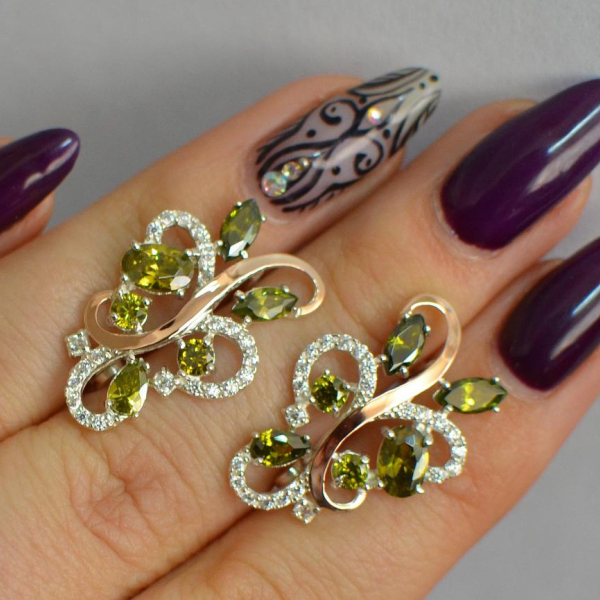 Срібні сережки з золотими вставками