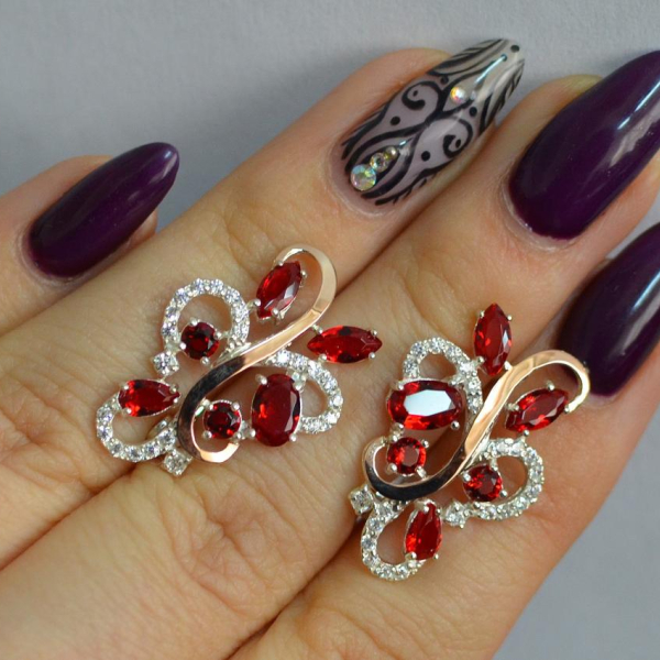 Срібні сережки з золотими вставками