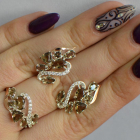 Срібний набір з золотими пластинами