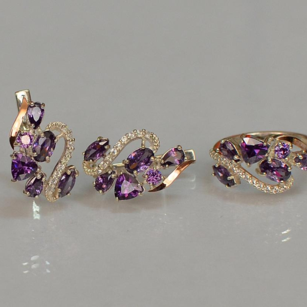 Срібний набір з золотими пластинами