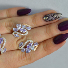 Срібний набір з золотими пластинами