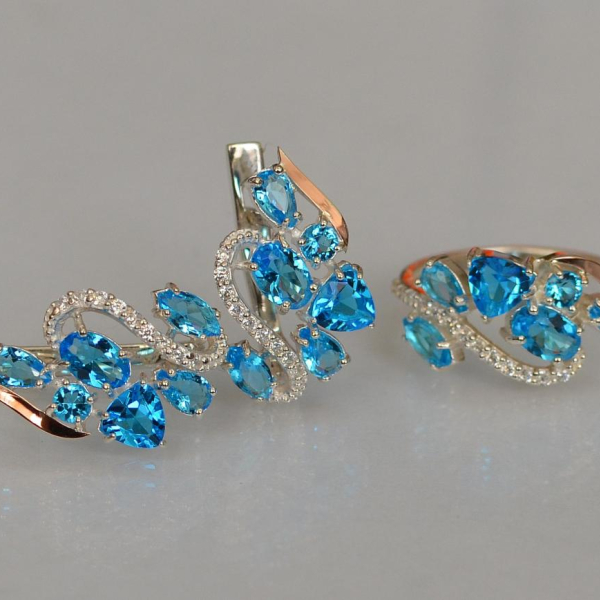 Срібний набір з золотими пластинами