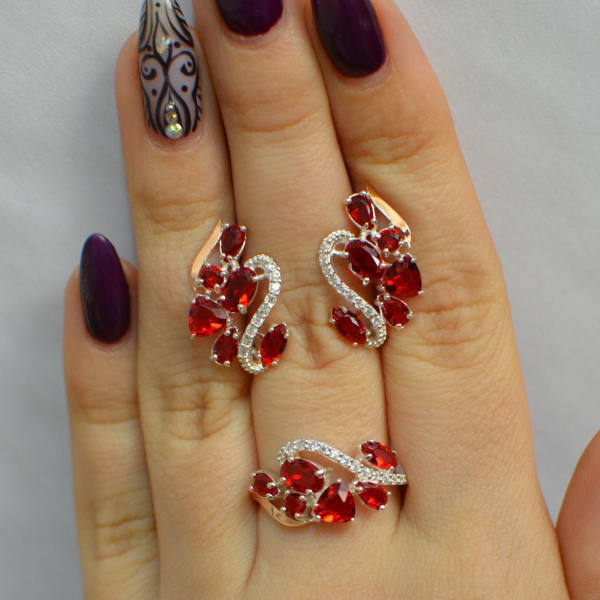 Срібний набір з золотими пластинами