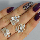 Срібний набір з золотими пластинами