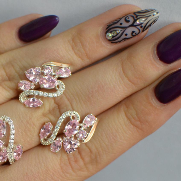 Срібний набір з золотими пластинами