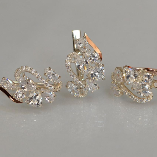 Срібний набір з золотими пластинами