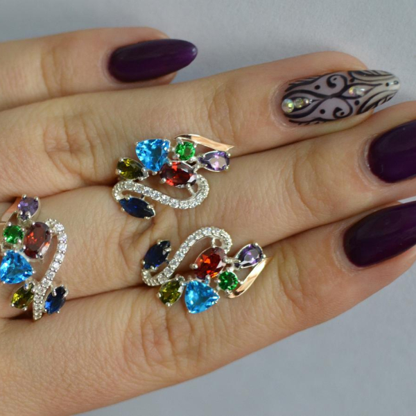 Срібний набір з золотими пластинами