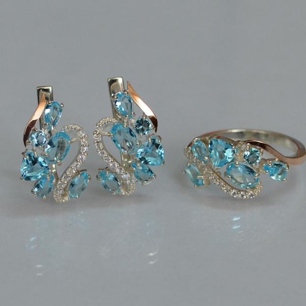 Срібний набір з золотими пластинами