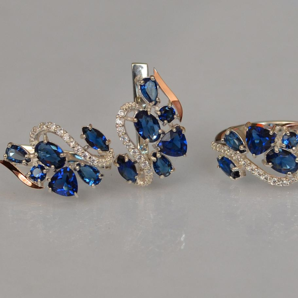 Срібний набір з золотими пластинами