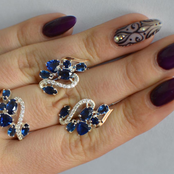 Срібний набір з золотими пластинами