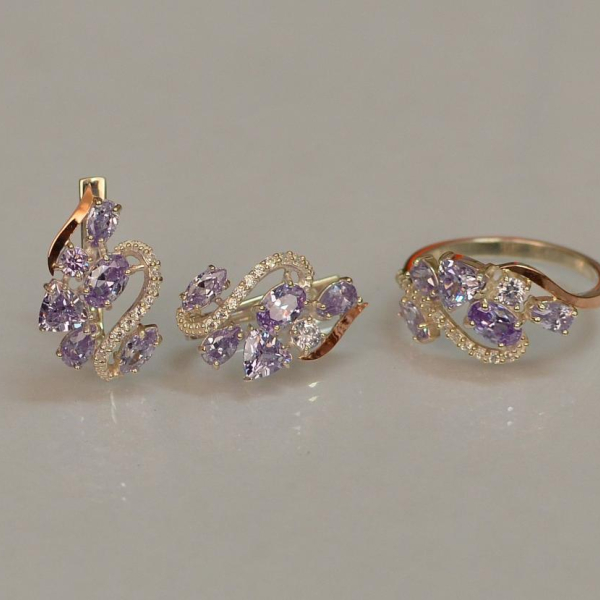 Срібний набір з золотими пластинами