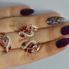 Срібний набір з золотими пластинами