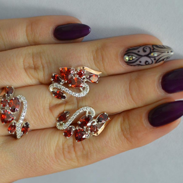 Срібний набір з золотими пластинами