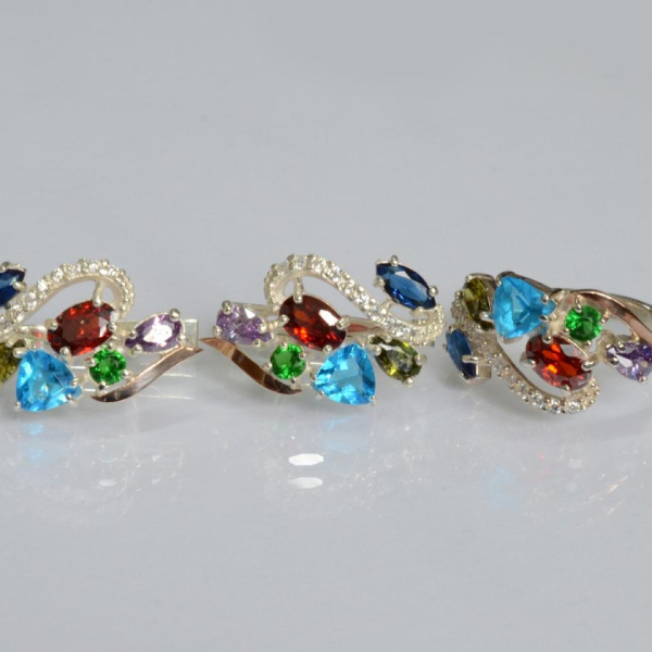 Срібний набір з золотими пластинами