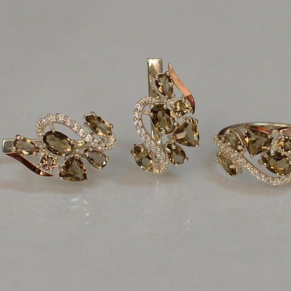 Срібний набір з золотими пластинами