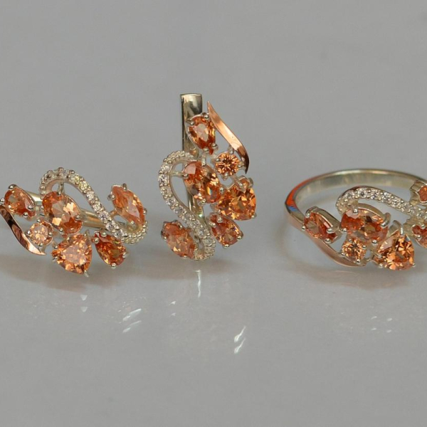 Срібний набір з золотими пластинами