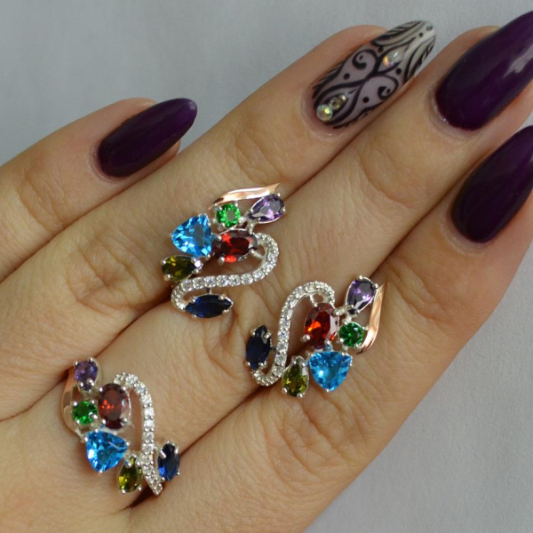 Срібний набір з золотими пластинами