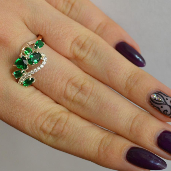 Срібна каблучка з золотими вставками