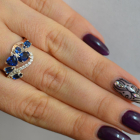 Срібна каблучка з золотими вставками