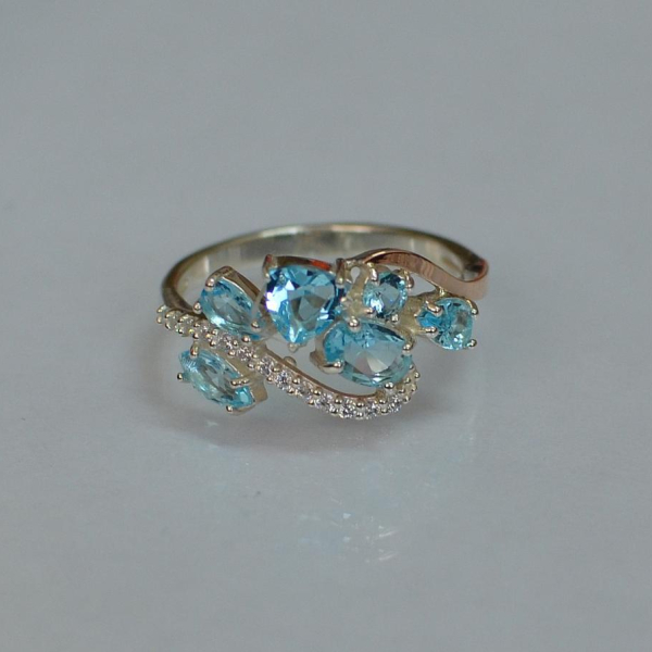 Срібна каблучка з золотими вставками